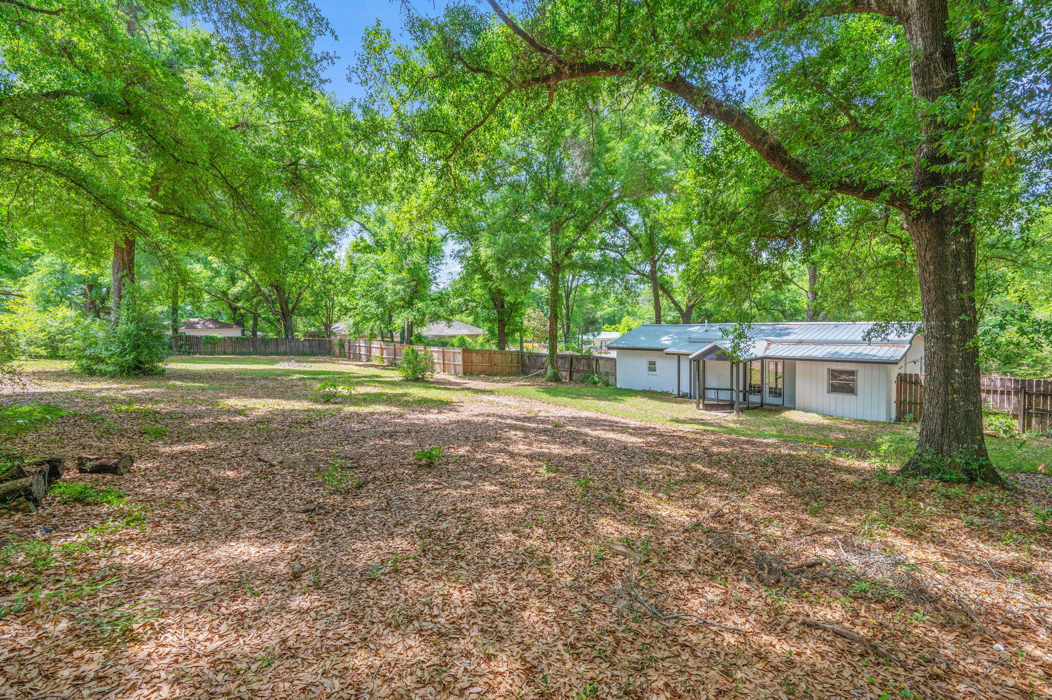 165 Smith Street Crestview, FL 32539 - Photo 29 of 30 a view of a big yard with large trees