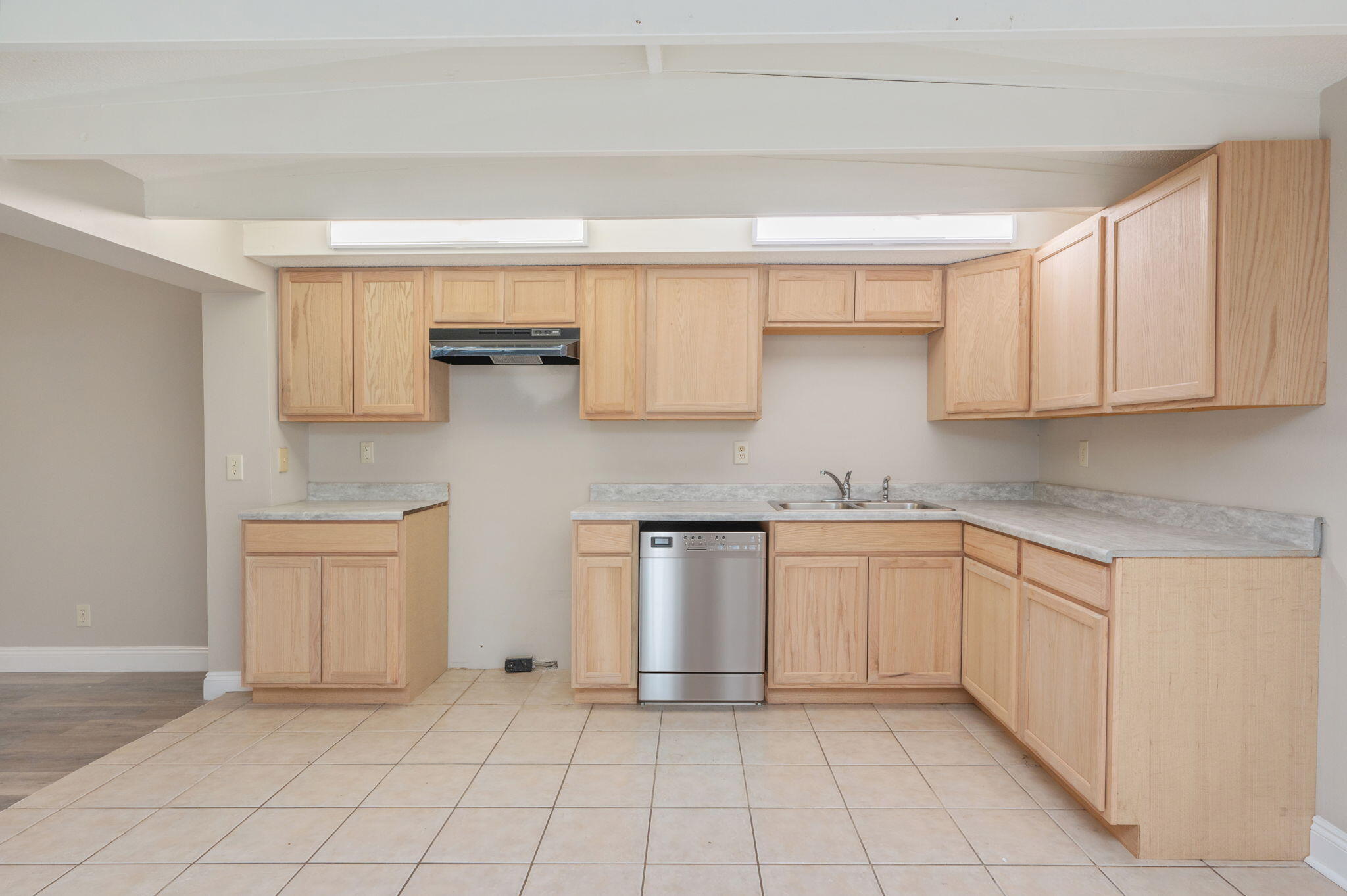 165 Smith Street Crestview, FL 32539 - Photo 8 of 30 a kitchen with stainless steel appliances granite countertop a sink and a stove top oven
