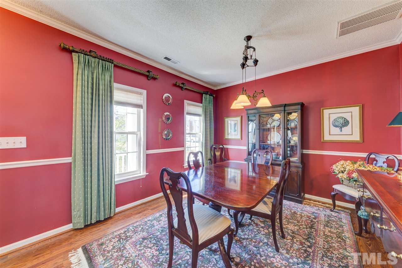 2116 Haig Point Way Raleigh, NC 27604 - Photo 2 of 25 Imagine hosting meals in your well-appointed formal dining room with beautiful moldings and tons of natural light.
