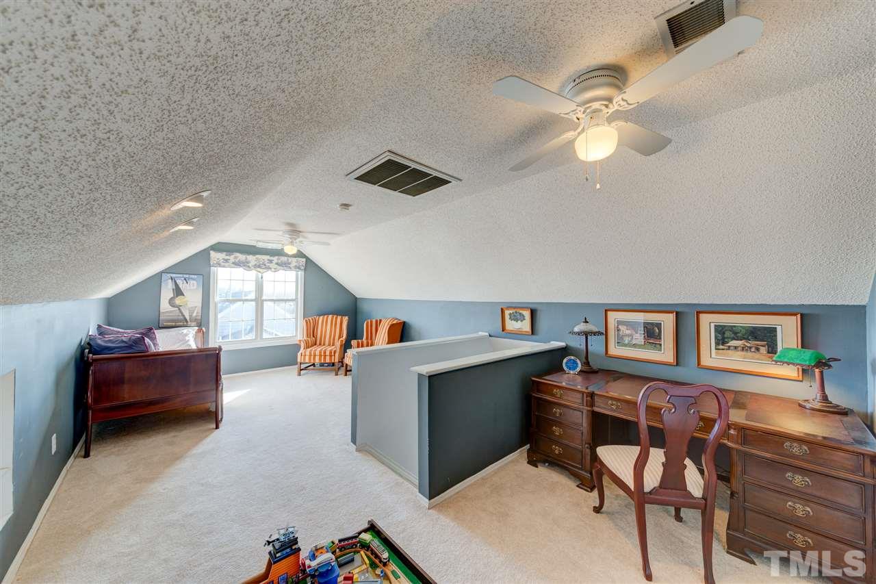 2116 Haig Point Way Raleigh, NC 27604 - Photo 16 of 25 This finished third-floor space is versatile and appealing. A perfect play room, home office, or rec room.
