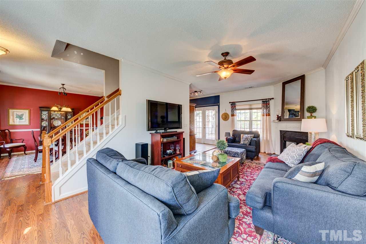 2116 Haig Point Way Raleigh, NC 27604 - Photo 3 of 25 Gather around the cozy gas fireplace in the evenings in your spacious family room.