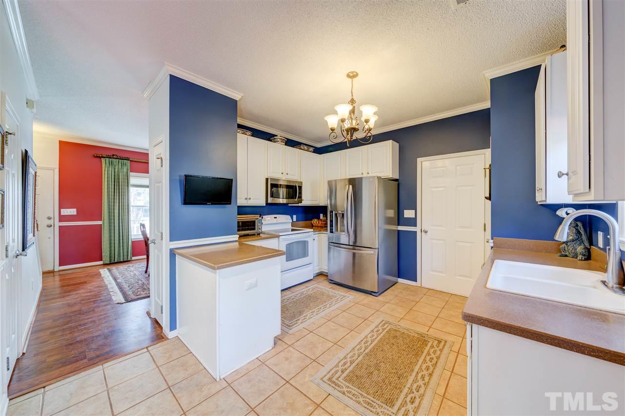 2116 Haig Point Way Raleigh, NC 27604 - Photo 6 of 25 Chefs will adore preparing meals in this open kitchen with plentiful cabinetry and counter space.