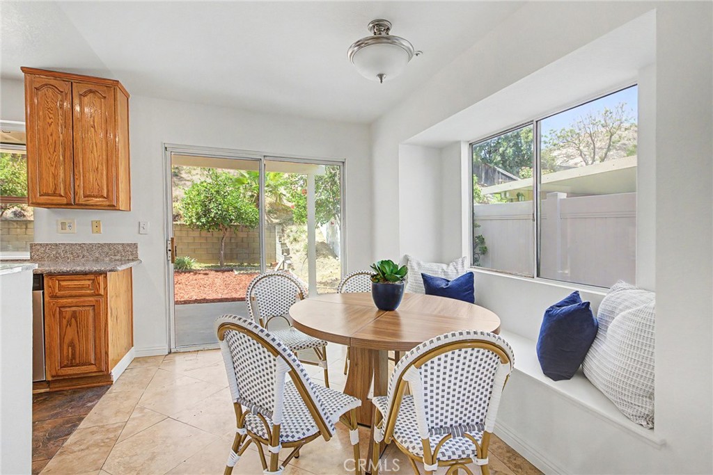 15377 Tobarra Road Fontana, CA 92337 - Photo 12 of 38 Sunny breakfast nook with a comfortable built-in seating bench