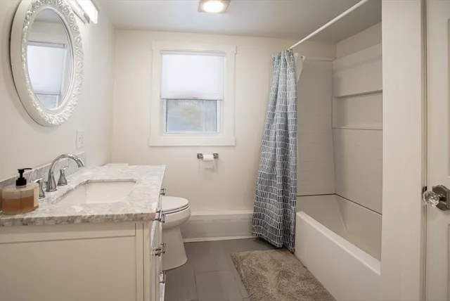 a kitchen with stainless steel appliances a refrigerator and a stove