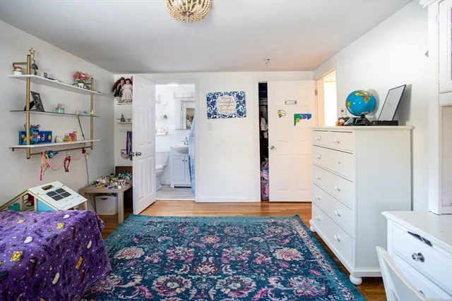 a bathroom with a toilet sink and shower