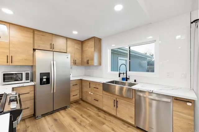 a room with sink and window