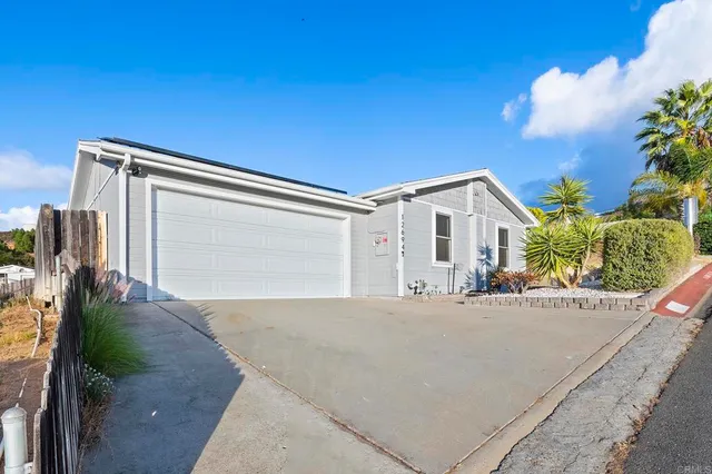 an aerial view of a house with a garden