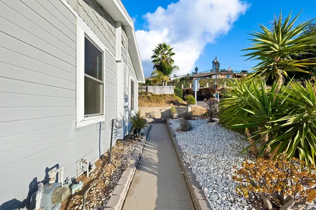 a view of a house with roof deck