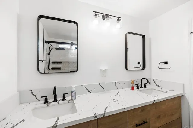 a kitchen with stove and cabinets