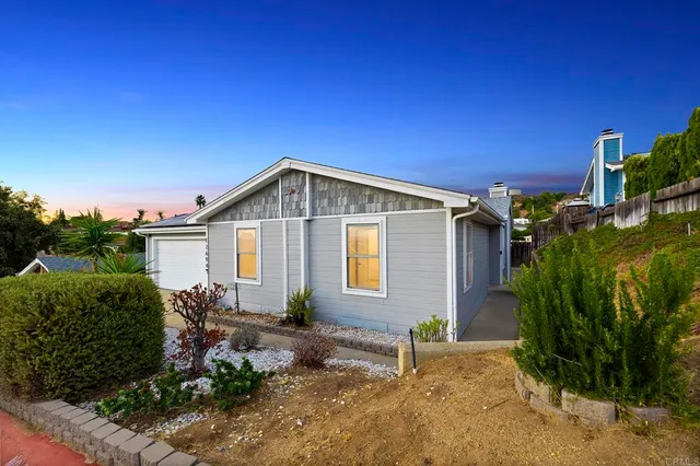 a view of houses with a swimming pool