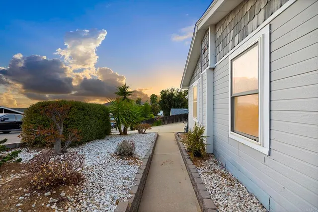 an aerial view of a house with a garden