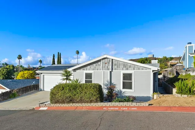 a view of a balcony with furniture