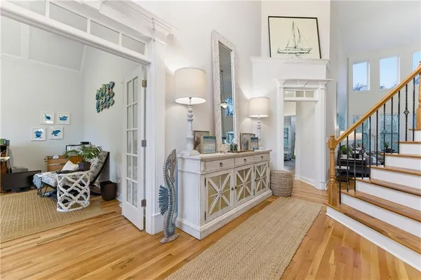 a kitchen with stainless steel appliances a refrigerator sink and microwave