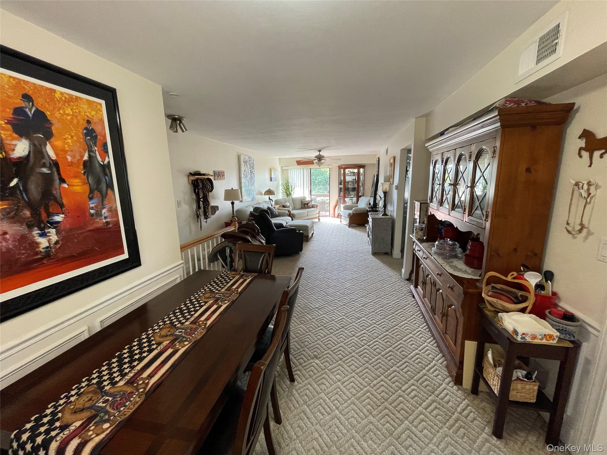 107 Mariners Way Copiague, NY 11726 - Photo 7 of 27 a living room with furniture