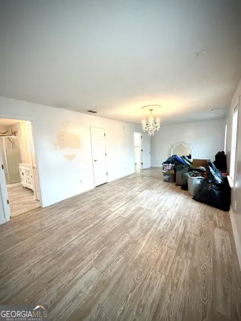 a view of a livingroom with wooden floor