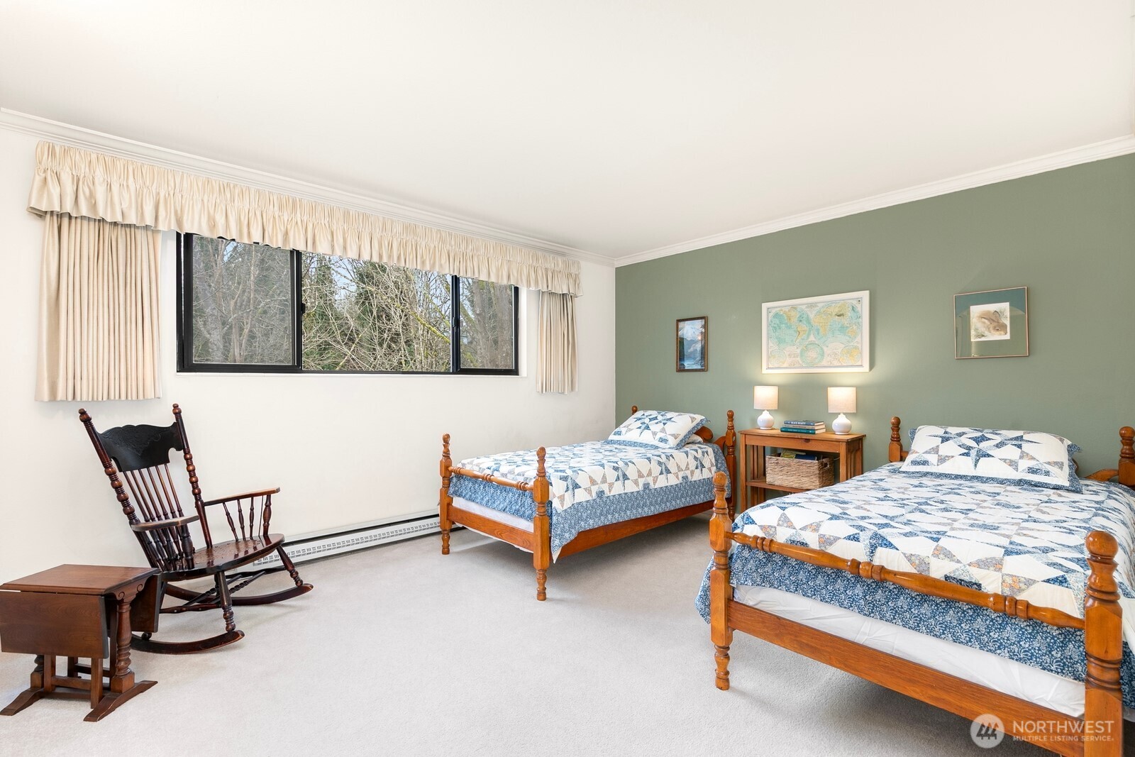 3113 West Harley Street, Unit 3115 Seattle, WA 98199 - Photo 22 of 28 a bedroom with a bed chair and window