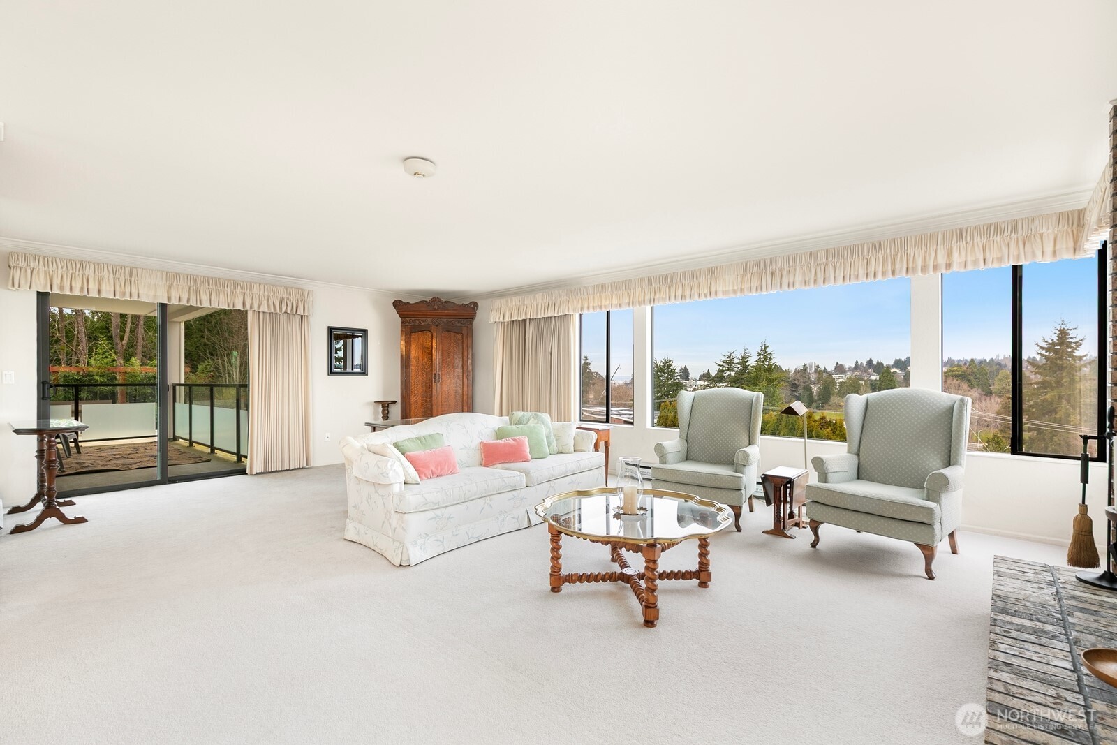 3113 West Harley Street, Unit 3115 Seattle, WA 98199 - Photo 7 of 28 a living room with furniture and large windows