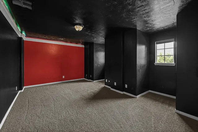 a living room with furniture a window and a table