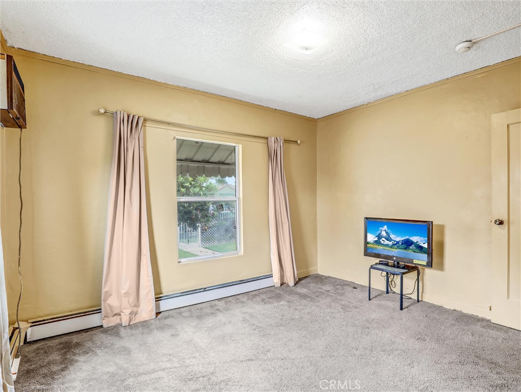 405 South Ward Avenue Compton, CA 90221 - Photo 11 of 28 a view of an empty room with a window