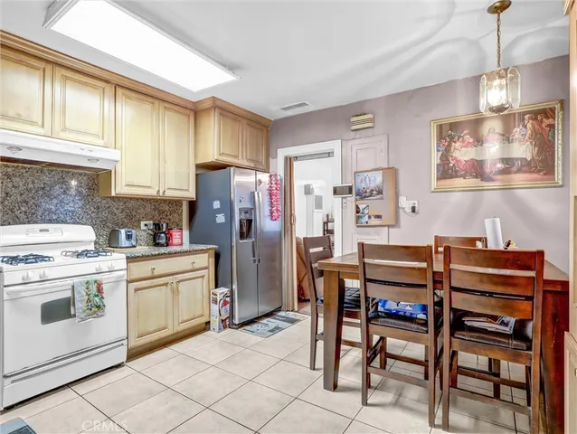 a kitchen that has a cabinets counter space and appliances
