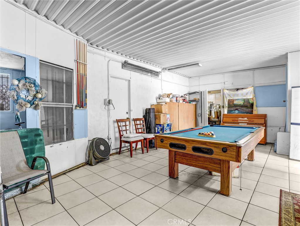 405 South Ward Avenue Compton, CA 90221 - Photo 19 of 28 a room with furniture and pool table