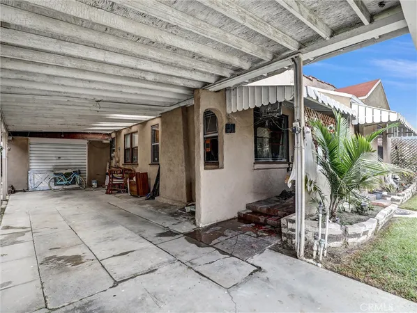 a view of a garage with chairs