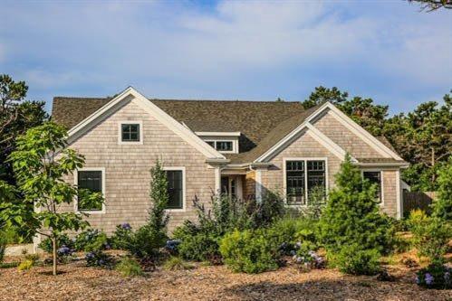 5 Yellow Brick Road Truro, MA 02666 - Photo 1 of 20 a view of a house with a yard and potted plants