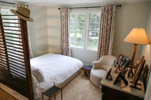 5 Yellow Brick Road Truro, MA 02666 - Photo 13 of 20 a bedroom with a bed and a lamp
