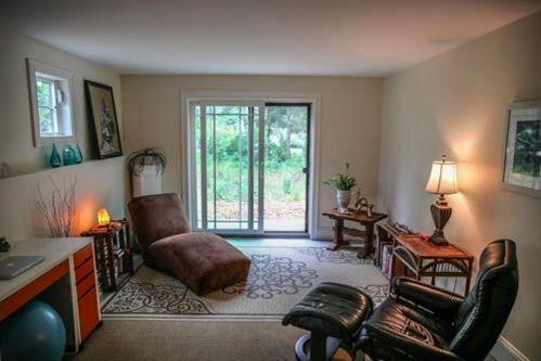 5 Yellow Brick Road Truro, MA 02666 - Photo 15 of 20 a living room with furniture and a window