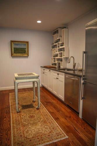 5 Yellow Brick Road Truro, MA 02666 - Photo 7 of 20 a kitchen with stainless steel appliances granite countertop a sink stove and cabinets