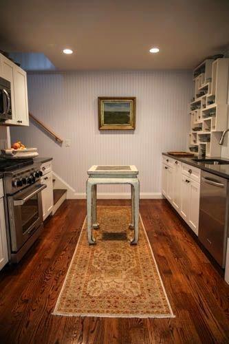 5 Yellow Brick Road Truro, MA 02666 - Photo 9 of 20 a kitchen with wooden floors and appliances