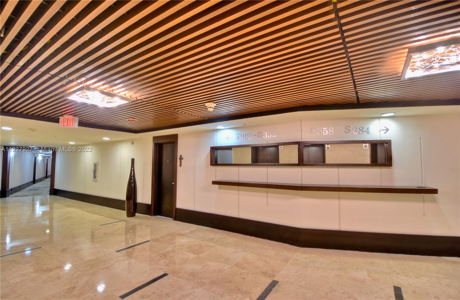1500 Bay Road, Unit 364S Miami Beach, FL 33139 - Photo 27 of 28 a view of a building with an entryway