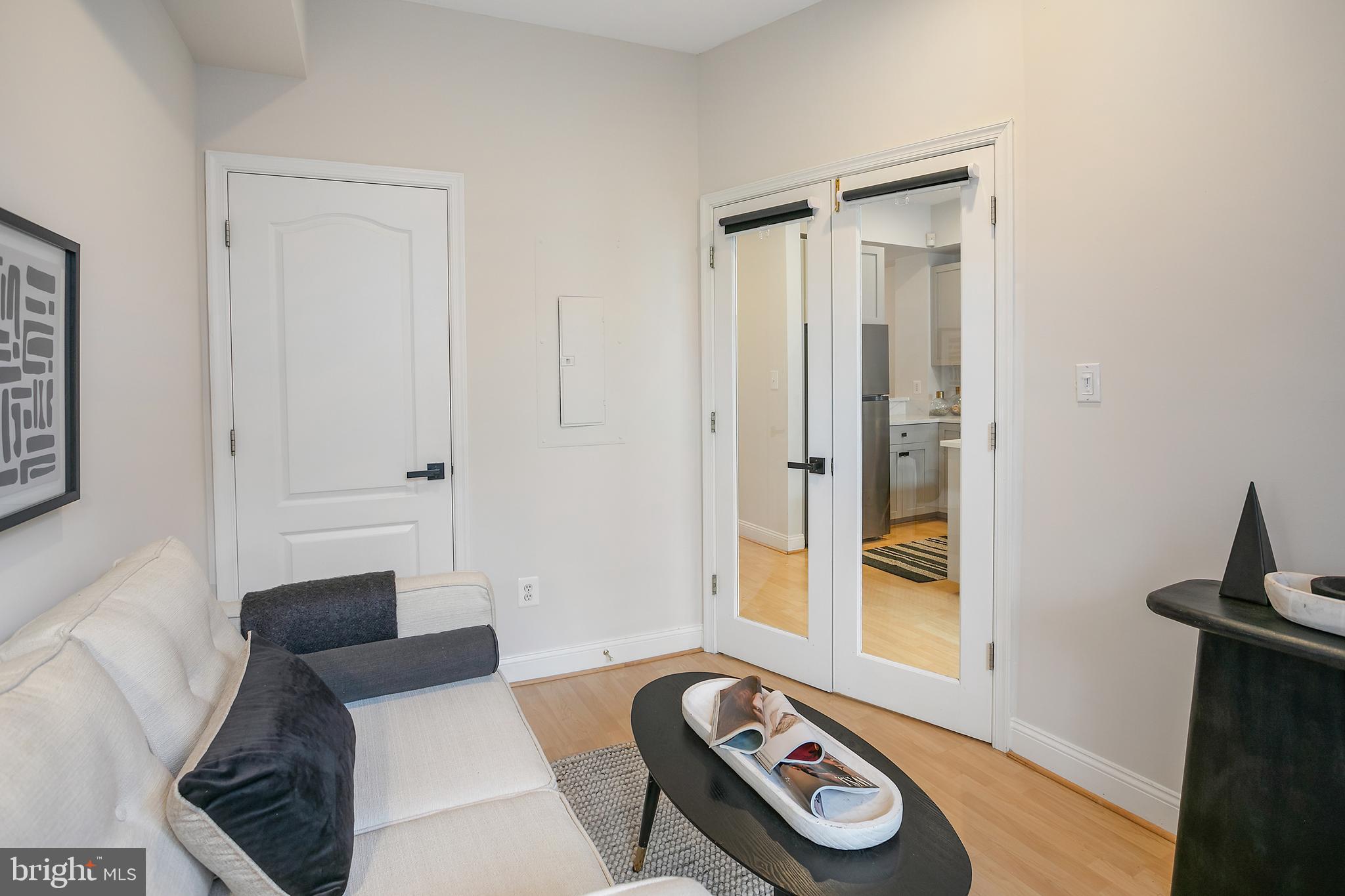 27 Logan Circle Northwest, Unit 5 Washington, DC 20005 - Photo 15 of 35 Den with French Doors