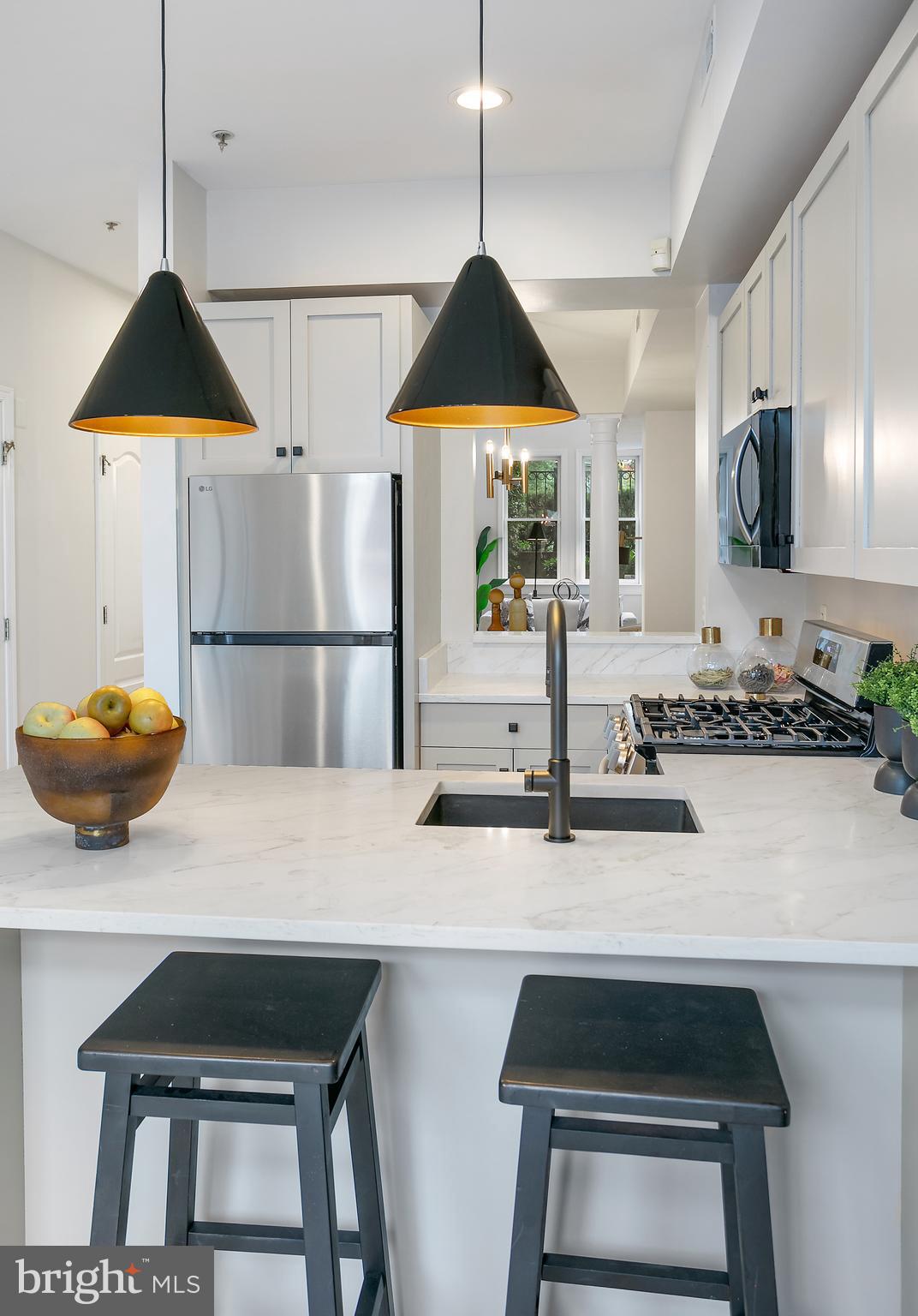 27 Logan Circle Northwest, Unit 5 Washington, DC 20005 - Photo 16 of 35 Kitchen with Peninsula Seating