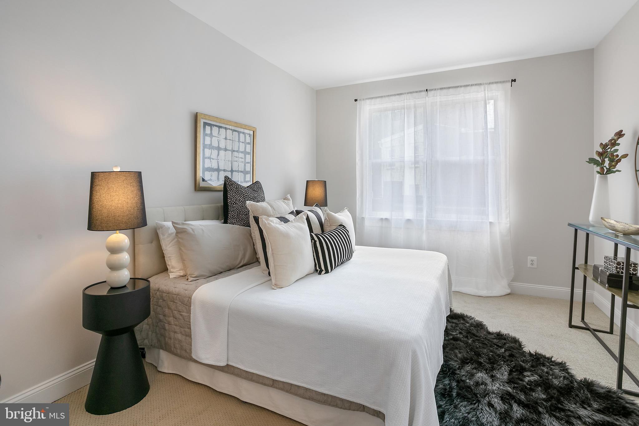 27 Logan Circle Northwest, Unit 5 Washington, DC 20005 - Photo 19 of 35 Light-filled Primary Bedroom