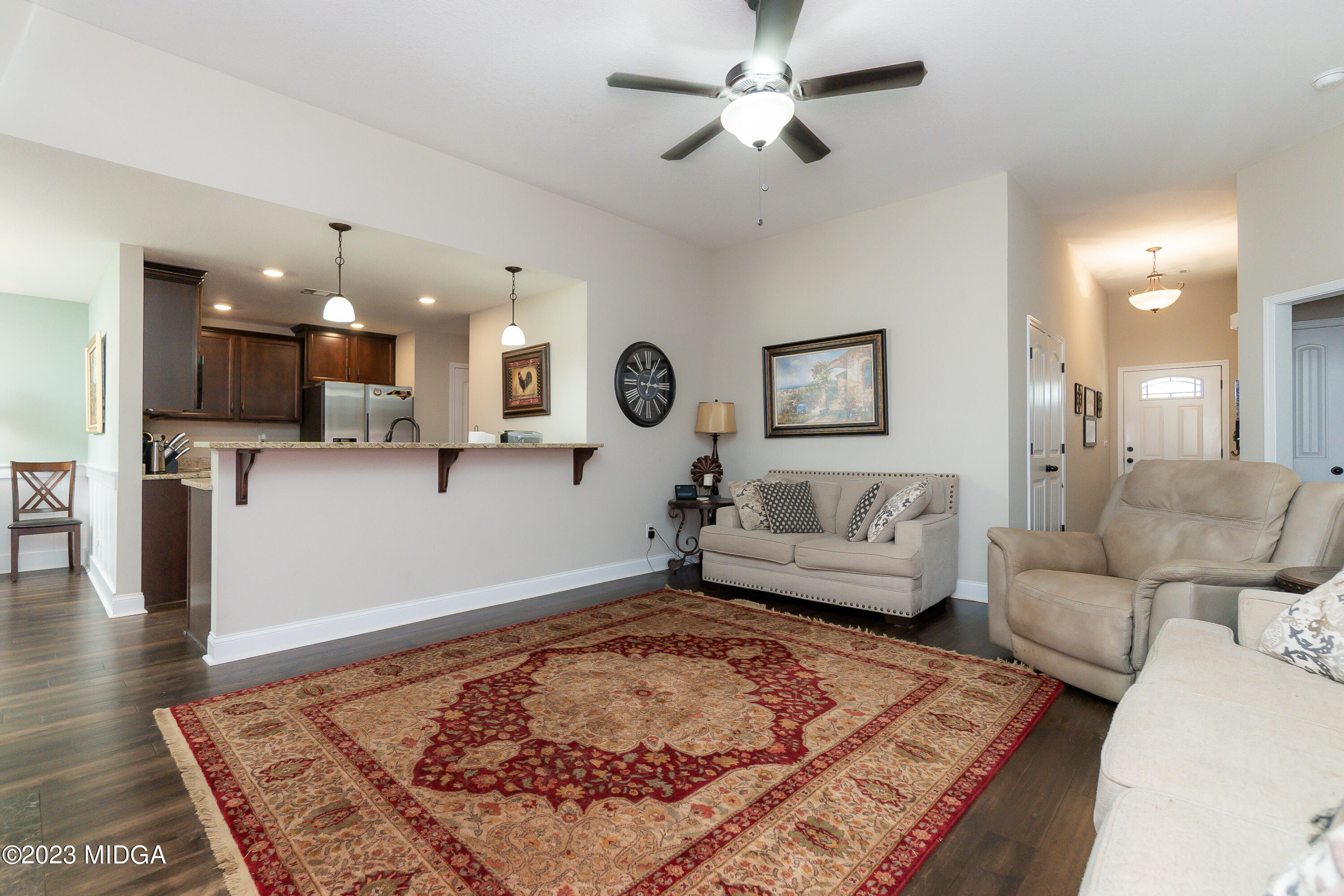 163 Hawks Rdg Trace Byron, GA 31008 - Photo 8 of 56 a living room with furniture and a wooden floor