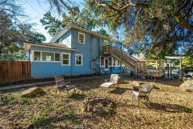 a kitchen that has a sink and a stove in it