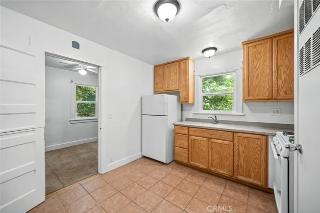 a house with trees in the background