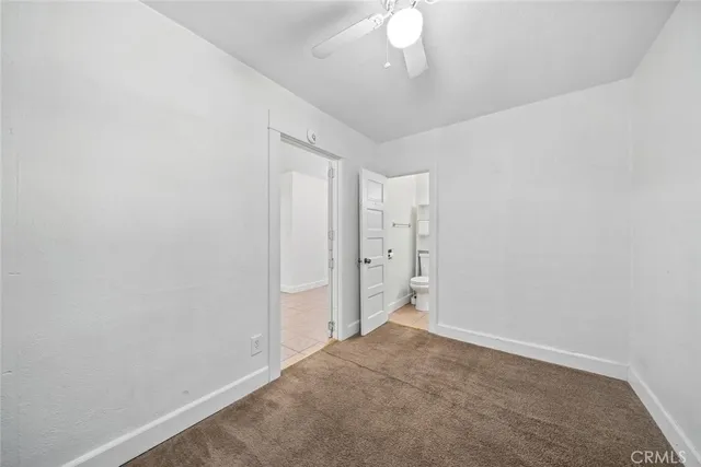 a view of street with large trees