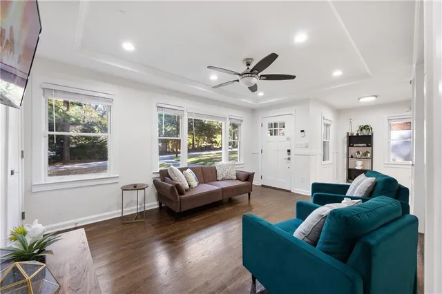 a view of a dining room with furniture window and wooden floor