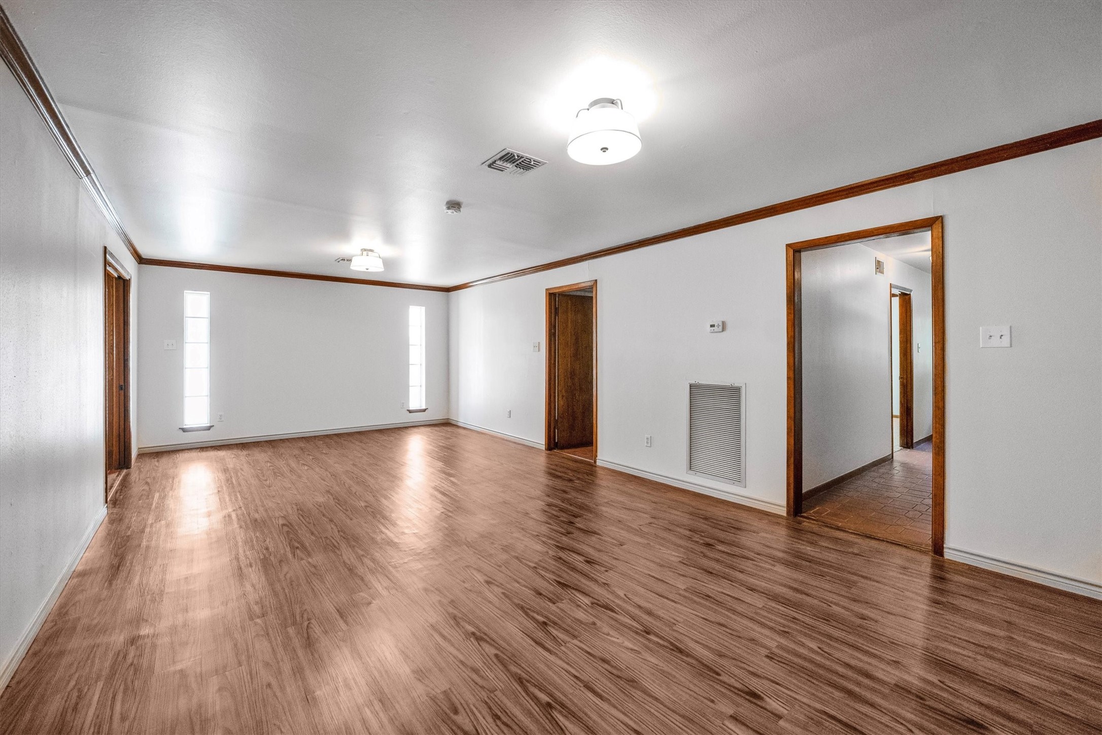 1417 15th Street Huntsville, TX 77340 - Photo 13 of 45 a view of a livingroom with wooden floor