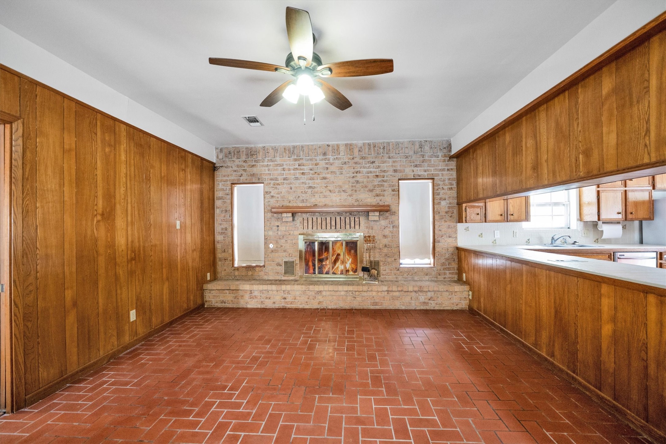 1417 15th Street Huntsville, TX 77340 - Photo 17 of 45 a view of living room with granite countertop furniture and a fireplace