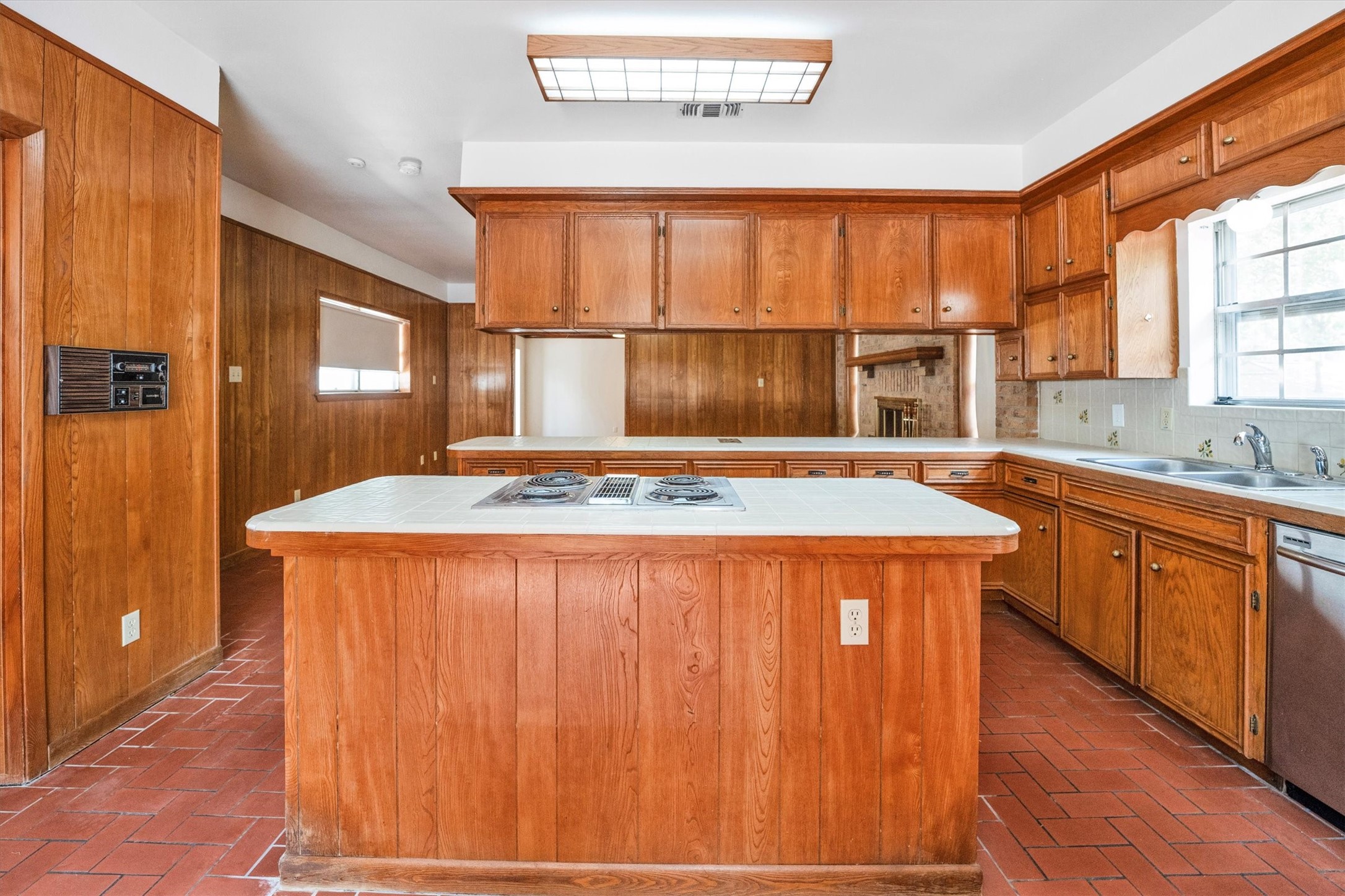1417 15th Street Huntsville, TX 77340 - Photo 23 of 45 a spacious bathroom with a granite countertop sink and a large mirror