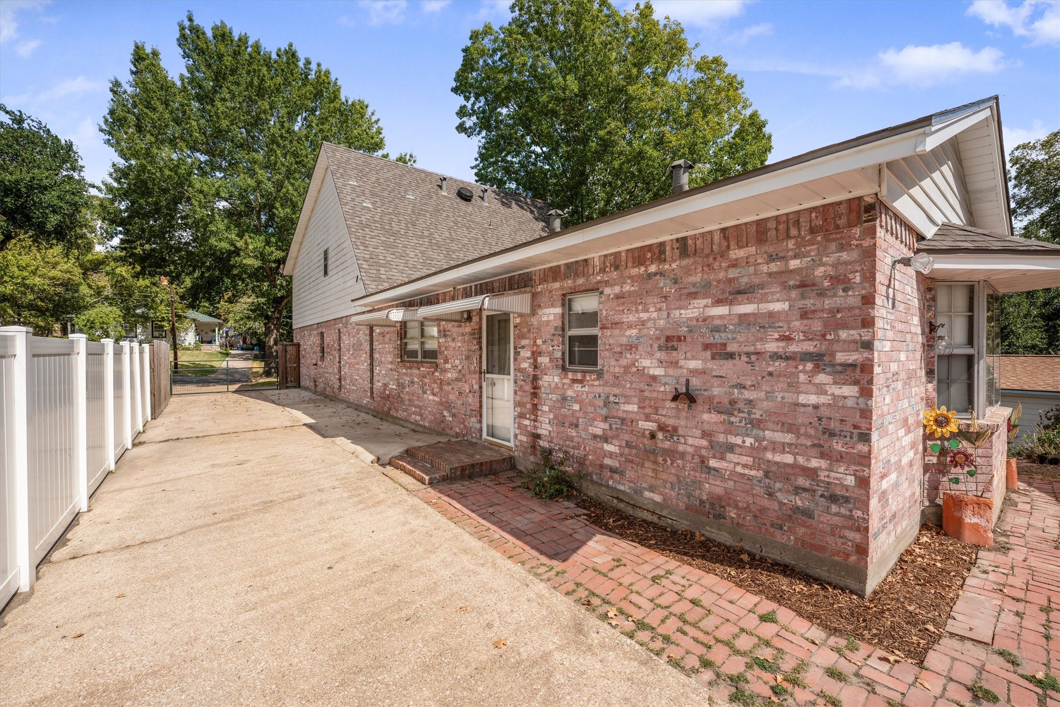 1417 15th Street Huntsville, TX 77340 - Photo 40 of 45 a view of a patio with wooden fence