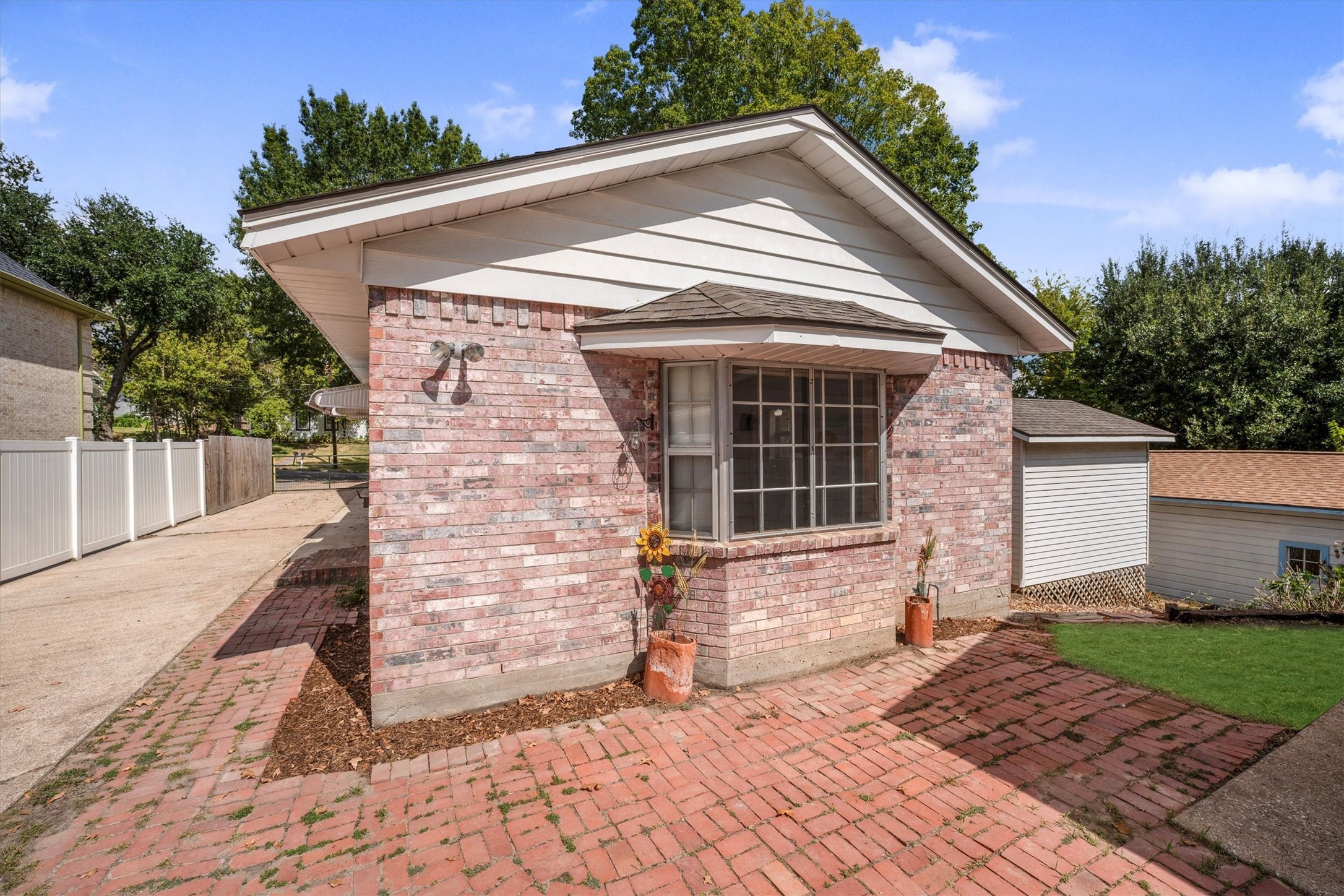1417 15th Street Huntsville, TX 77340 - Photo 42 of 45 a front view of a house with a yard