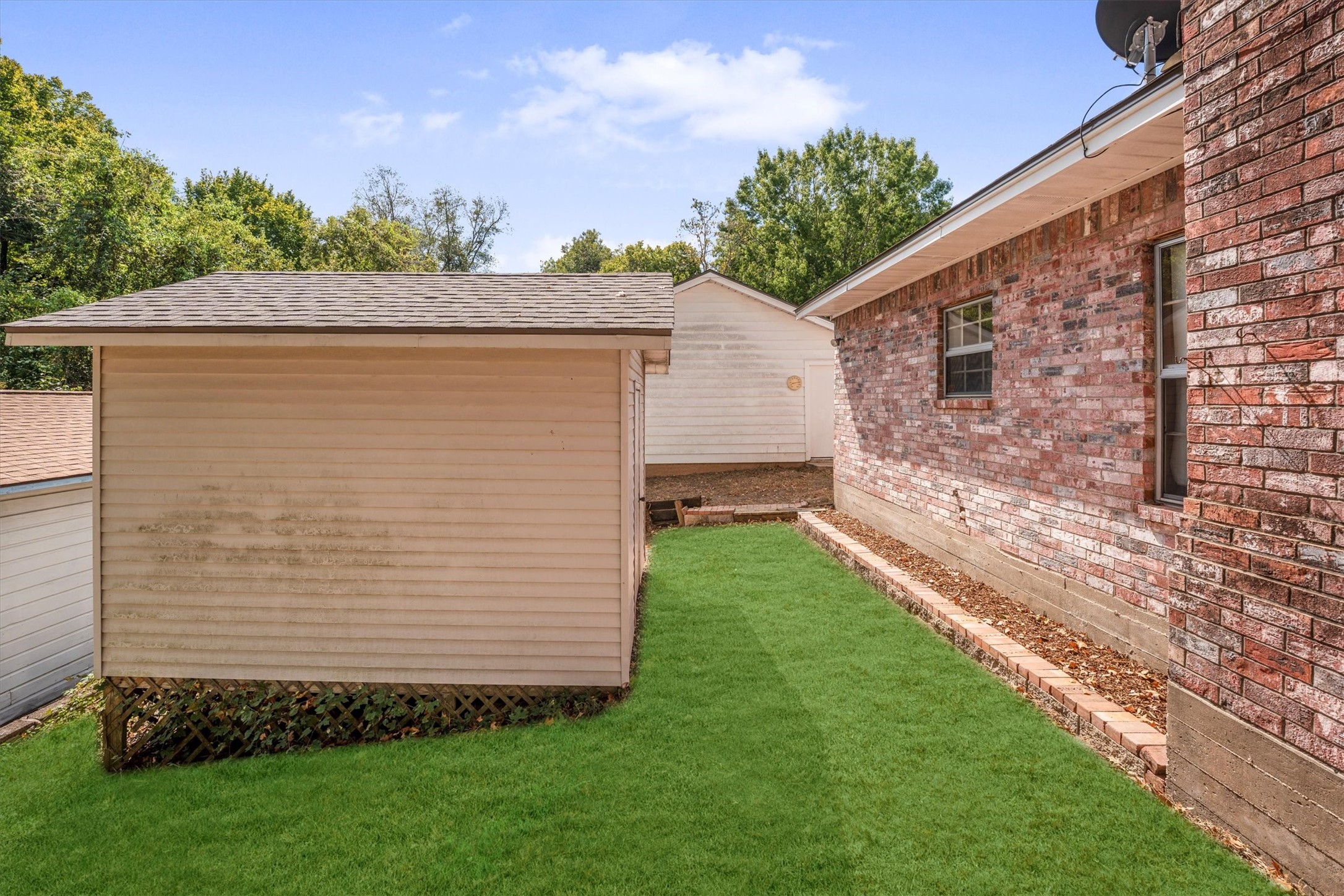 1417 15th Street Huntsville, TX 77340 - Photo 43 of 45 a view of a backyard with potted plants