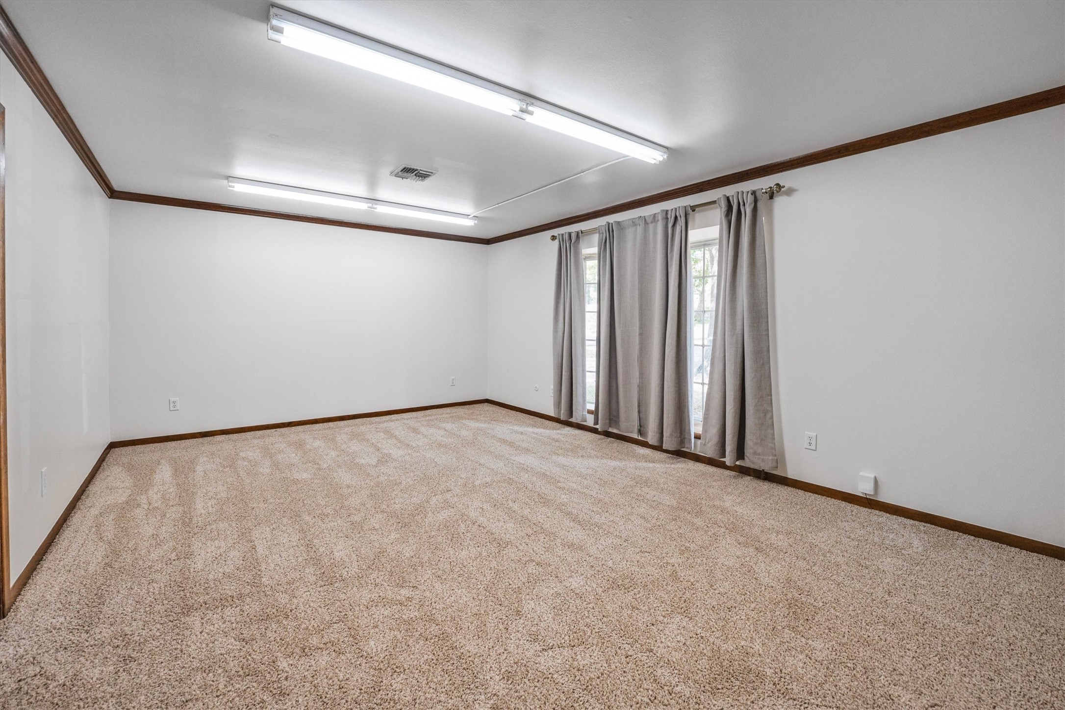 1417 15th Street Huntsville, TX 77340 - Photo 7 of 45 a view of an empty room