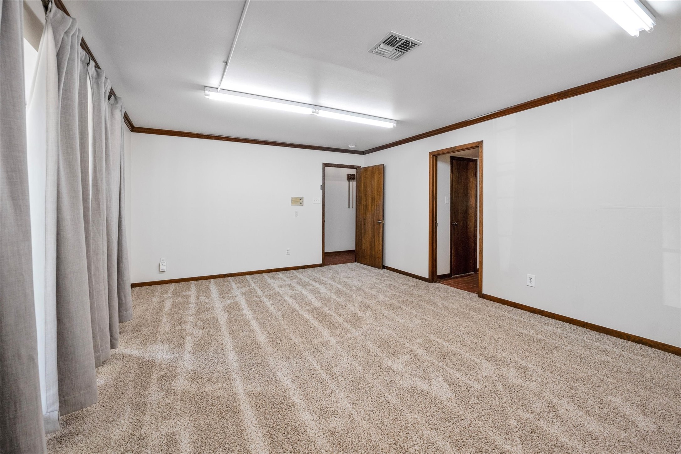 1417 15th Street Huntsville, TX 77340 - Photo 8 of 45 a view of an empty room