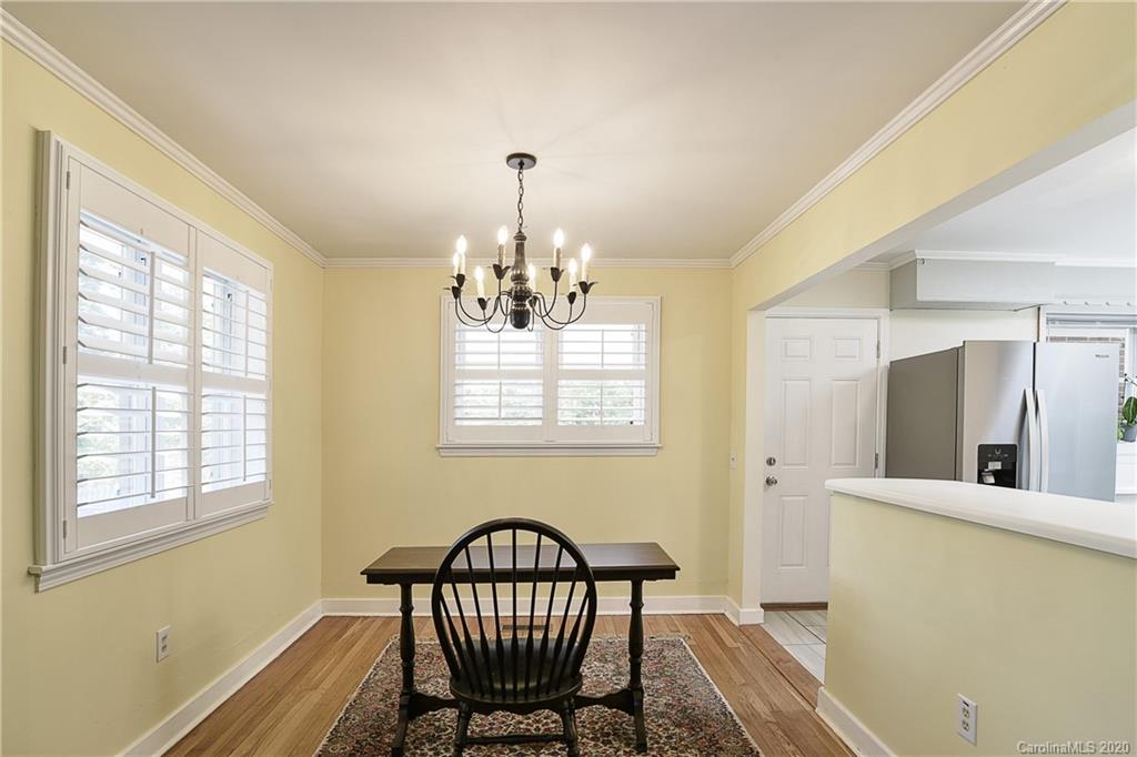 215 Rutledge Drive Hendersonville, NC 28739 - Photo 11 of 31 a view of a livingroom with furniture window and wooden floor