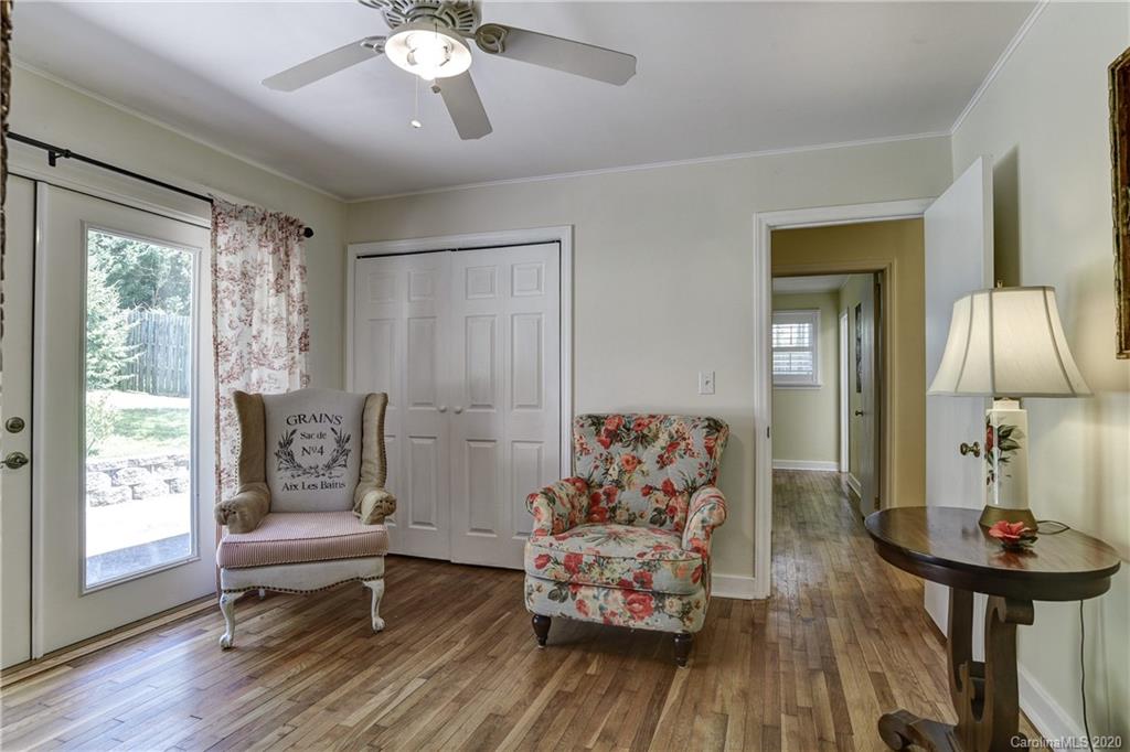 215 Rutledge Drive Hendersonville, NC 28739 - Photo 12 of 31 a living room with furniture and a window